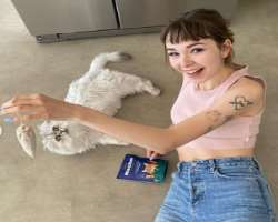 She loves to play with her cat in her spare time.